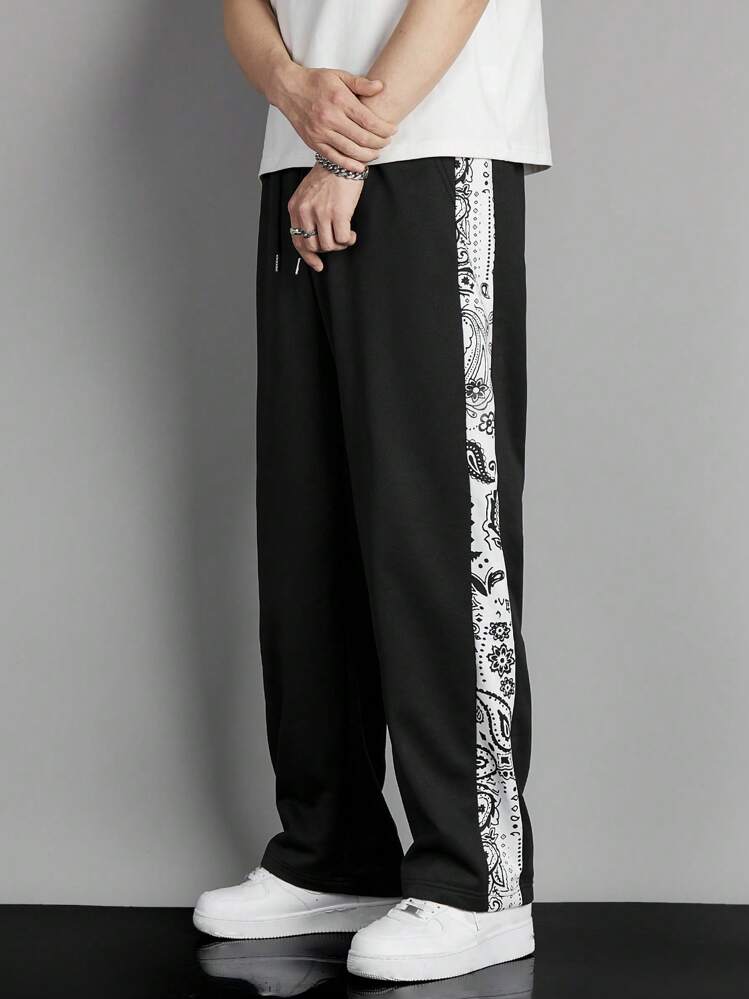 Black doodle trackpants