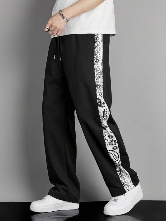 Black doodle trackpants