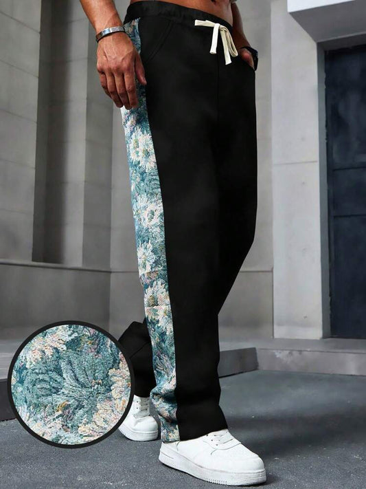 Black floral ocean trackpants
